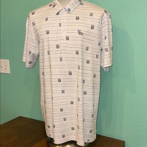 Travis Mathew coconut drink design polo.  
Shirt. Size XL. Great condition.